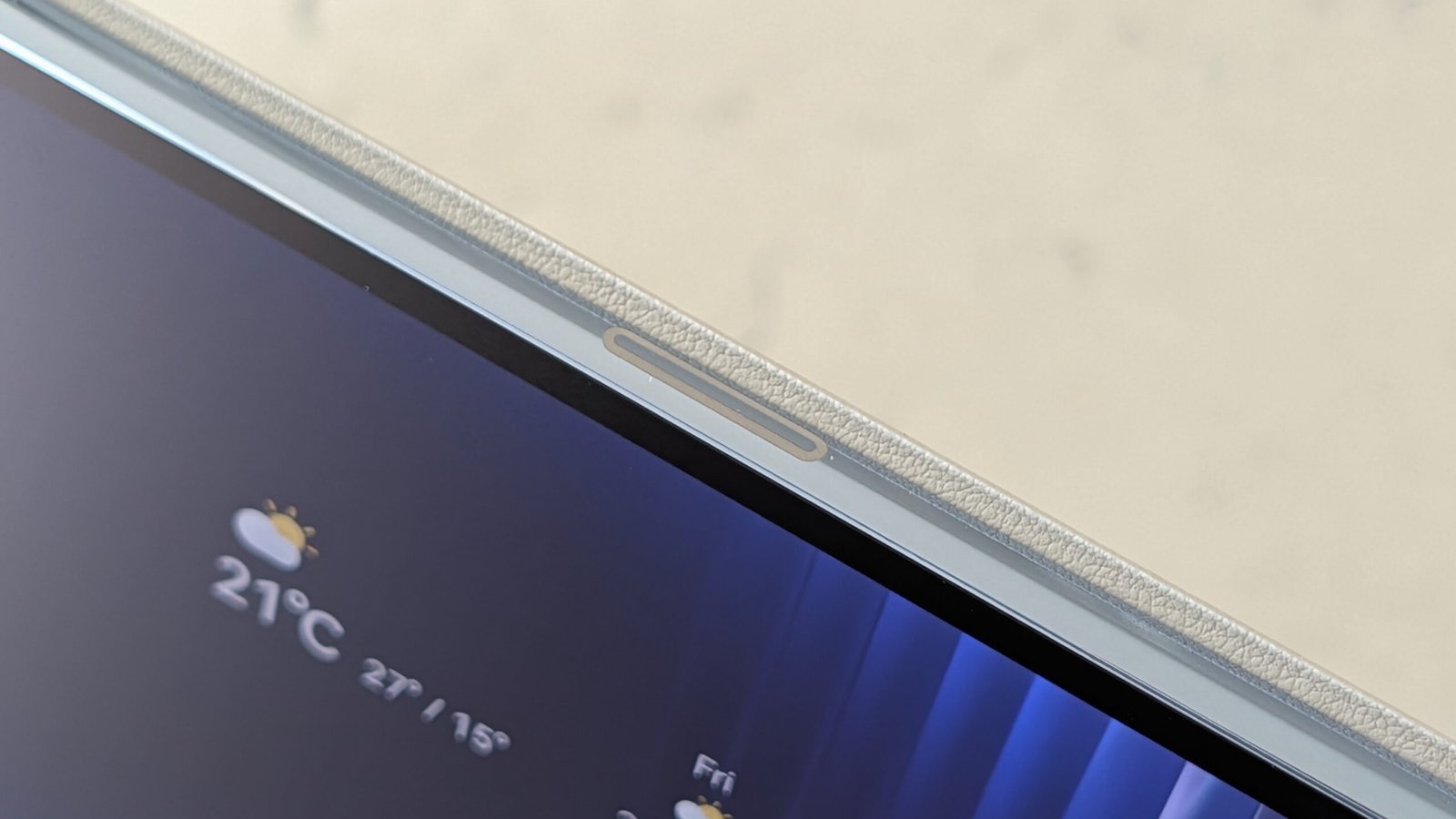 Photos of the Huawei MatePad Pro Max resting on a marble table