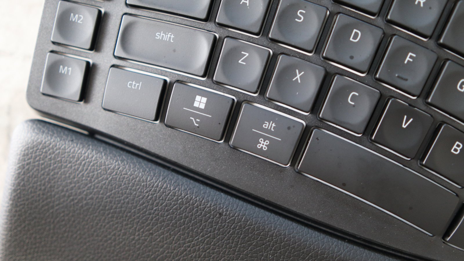 Razer Pro Type Ergo ergonomic keyboard on marble surface