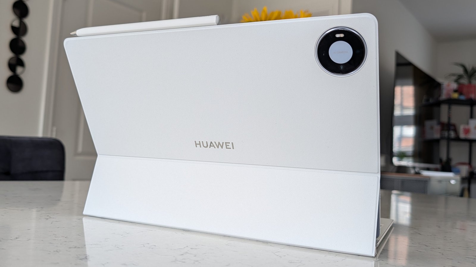 Photos of the Huawei MatePad Pro Max resting on a marble table